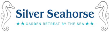 Logo des Silver Seahorse Garden Retreat mit stilisiertem Seepferdchen